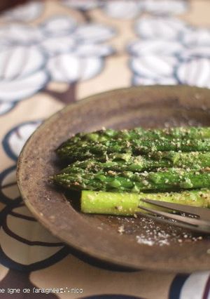 A picture of Asparagus Saute with Lots of Grated Cheese.
