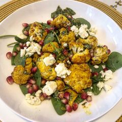 A picture of Turmeric roasted cauliflower salad with feta and zhoug style dressing.