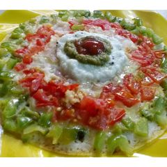 A picture of Veg Uttapam .