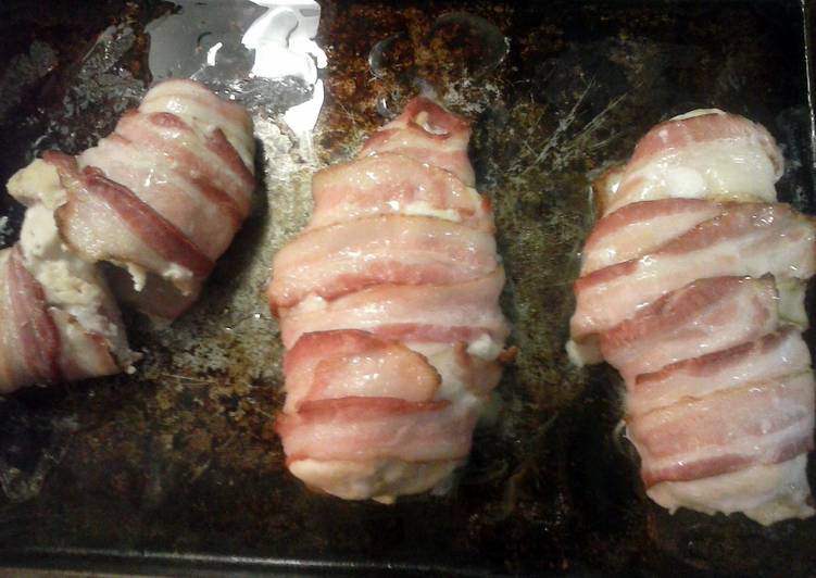 Bacon wrapped chicken stuffed with ham and cheese