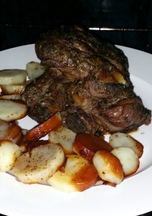 A picture of Lamb leg in oven.