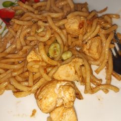 A picture of Spicy chicken udon noodles.