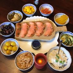 A picture of California Farm made Sour Cream, Cold Smoked Salmon and Potato Poffertjes.