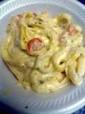 cheesy fettuccine with peas and carrots