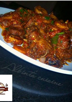A picture of Chicken with veggies and plantain.