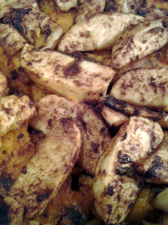 A picture of Baked apple and sweet potatoes.