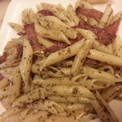 A picture of Penne Pesto with Ham.