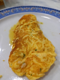 Una foto de Tortilla de bacalao, estilo sidrería