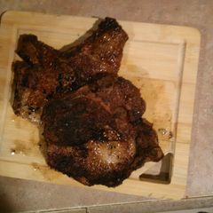 A picture of Pan fried pork chops.