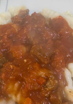 Una foto de Tuquito de carne cortada a cuchillo