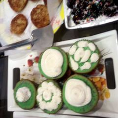 A picture of Rainbow cupcakes.