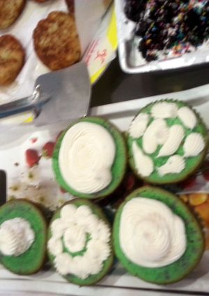 A picture of Rainbow cupcakes.