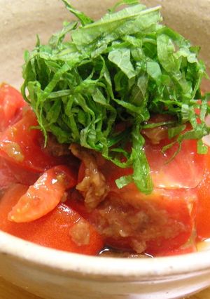 A picture of Tomatoes Dressed with Umeboshi Pickled Plums and Bonito Flakes.