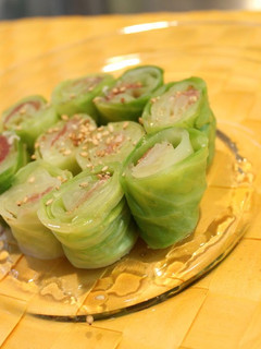 A picture of Rolled Cabbage and Cured Ham.