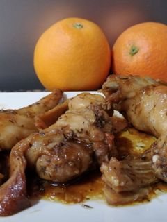 Una foto de Conejo en salsa de naranja y tomillo