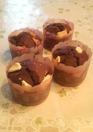 A picture of Chocolate Muffins With White Chocolate Chips.