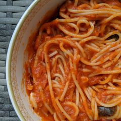 A picture of Spaghetti pasta in red sauce.