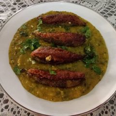 A picture of Stuffed karela curry.