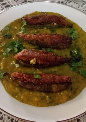 A picture of Stuffed karela curry.