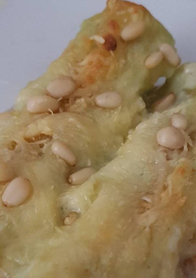 Una foto de Canelones de pollo en crema de ajoporro