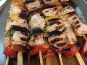 A picture of meat with herbs