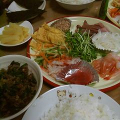 A picture of My Family's Hand-Rolled Sushi with Just A Bit of Sashimi.