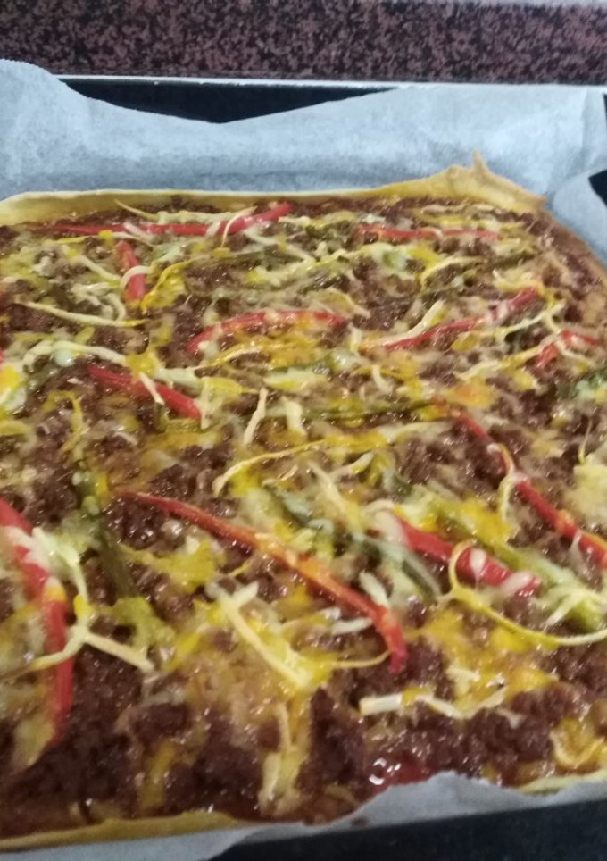Una foto de Pizza barbacoa