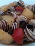 Patatas al vapor con caracoles