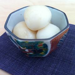 A picture of Soft Shiratama (Sticky Rice Ball) with Brown Sugar Syrup.