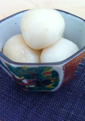A picture of Soft Shiratama (Sticky Rice Ball) with Brown Sugar Syrup.