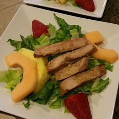 A picture of Fruit of land and sea dinner salad..