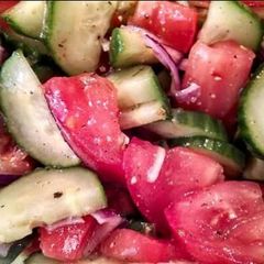 A picture of Tomato and Cucumber Salad.