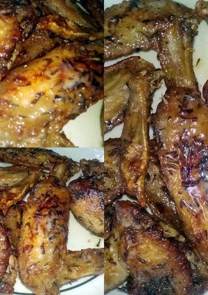 A picture of Buttered Chicken Wings with Fresh Thyme.