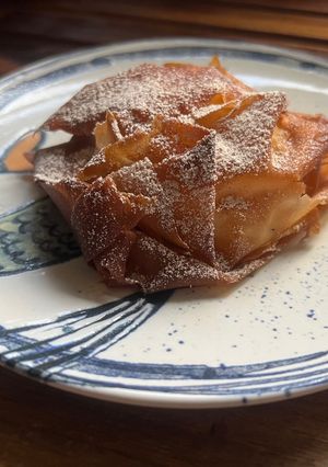 A picture of Bougatsa – Greek custard parcel.