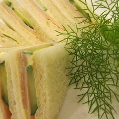 A picture of Juicy Sandwich with Ham & Cucumbers.