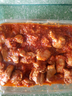 Una foto de Magra con tomate