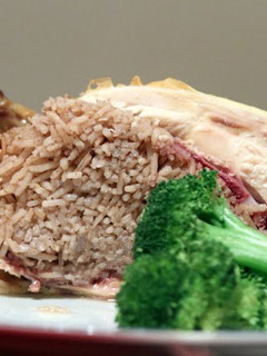 A picture of Cornish Game Hens Stuffed with Lebanese Dressing.