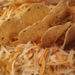 A picture of Layered Tostito Dip.