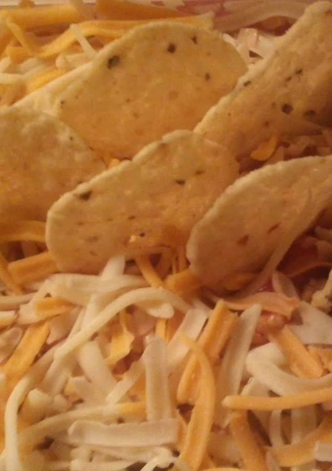 A picture of Layered Tostito Dip.