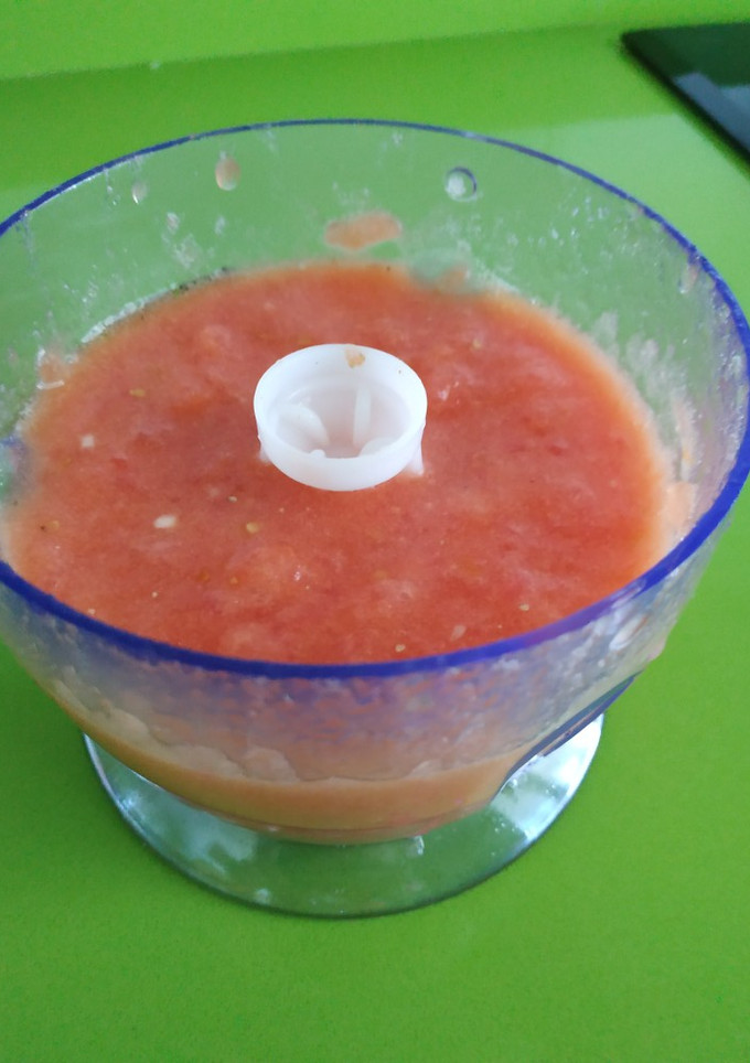 Una foto de Tomate triturado rico rico