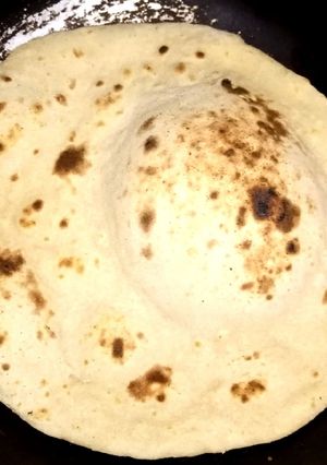A picture of Wheat flour Naan on tawa.