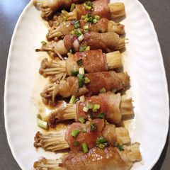 A picture of Enoki Mushroom Rolled with Bacon.