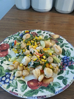 A picture of Sea Scallops on Succotash.