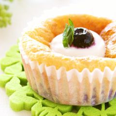 A picture of Tiny Blueberry Cheesecakes.