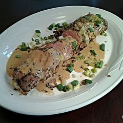 A picture of Sesame / Peanut Crusted Pork Tenderloin with Wasabi Cream Sauce.