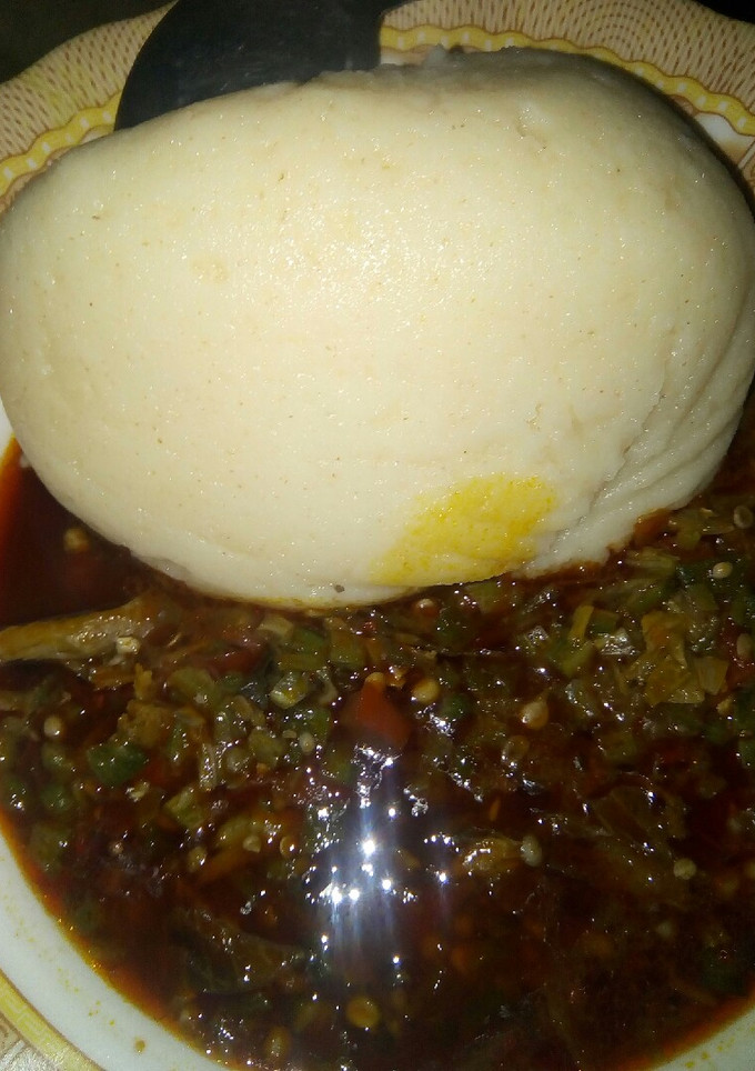 A picture of Semo and okro soup with dry fish.