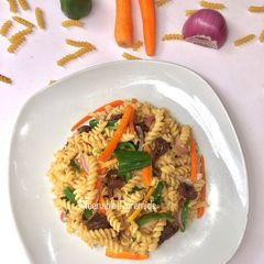 Fusilli and lamb chops stir fry A picture of Fusilli and lamb chops stir fry.