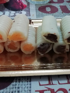 Una foto de Huesos de santo de yema y de Nutella