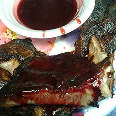 A picture of Pork spareribs with blackberry glaze.