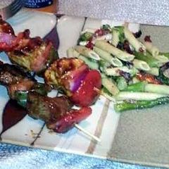 A picture of Pasta salad (penne with sauteed sun dried tomatoes, fresh basil, fresh garlic and asparagus).